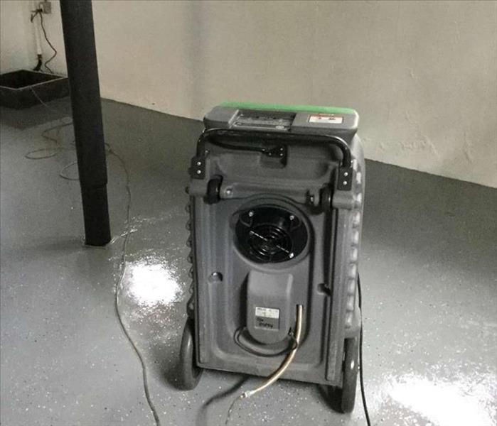 all standing water removed, dehumidifier pictured 