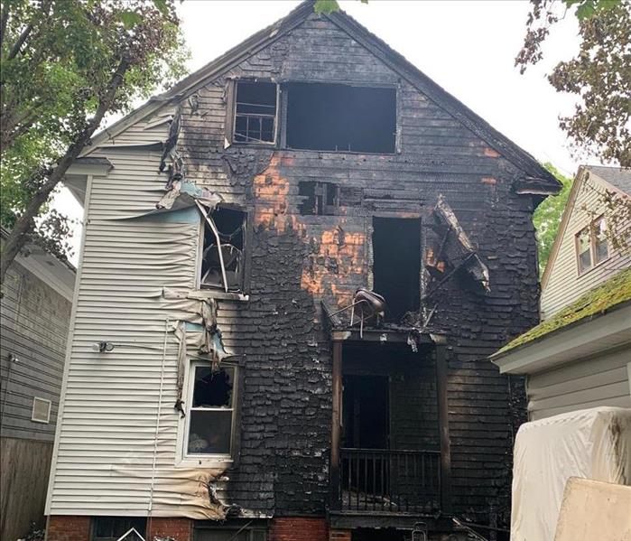 Side of a Branford, CT home completely charred due to fire damage 
