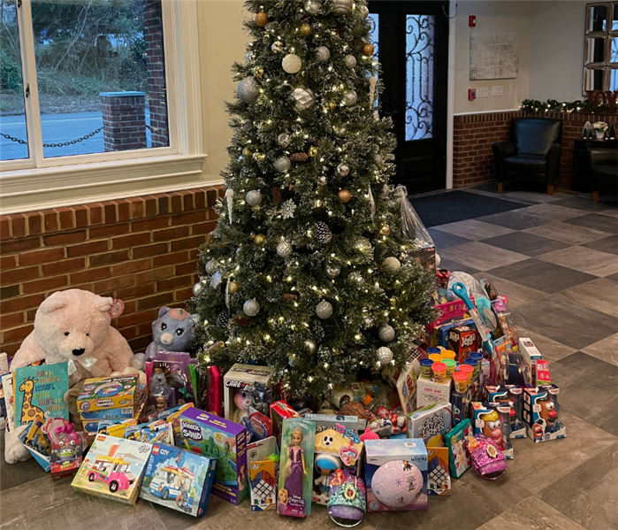 Toys under christmas tree for Connecticut Children's donation drive
